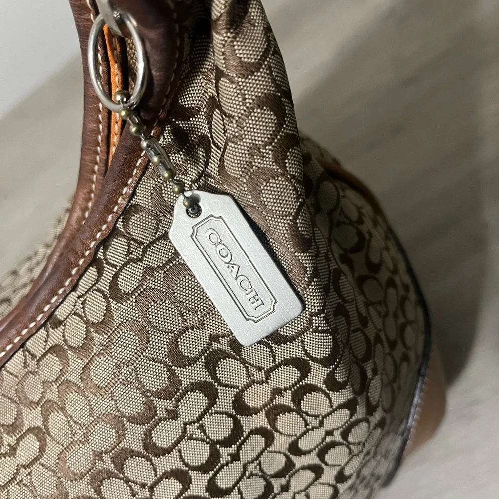 Coach Signature Monogram Hobo in Brown and Tan